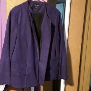 Purple suitcoat with black slacks